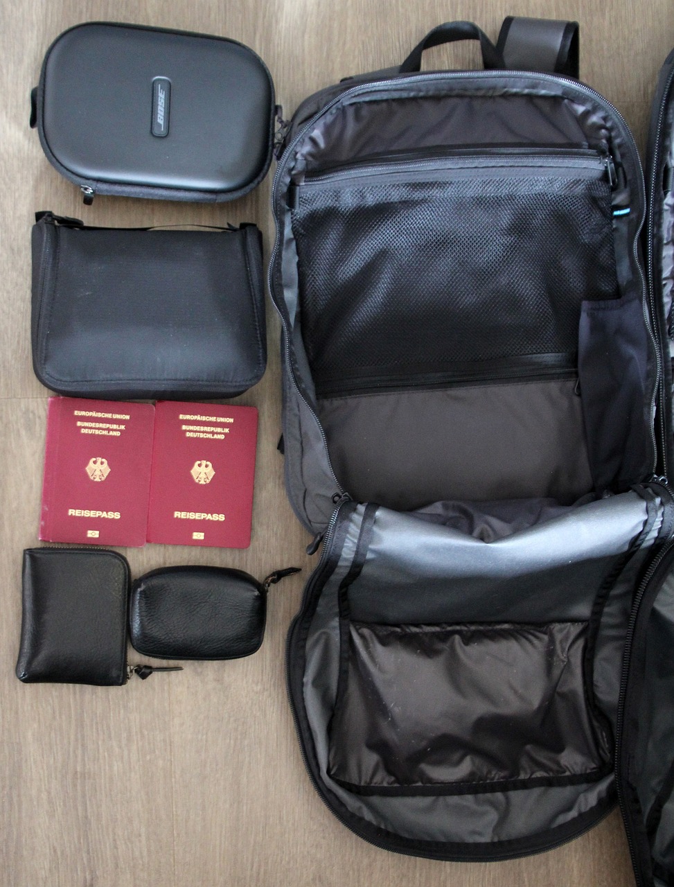 Carry-on roller bag in an airport terminal, the right place for a GLP-1 pen during travel