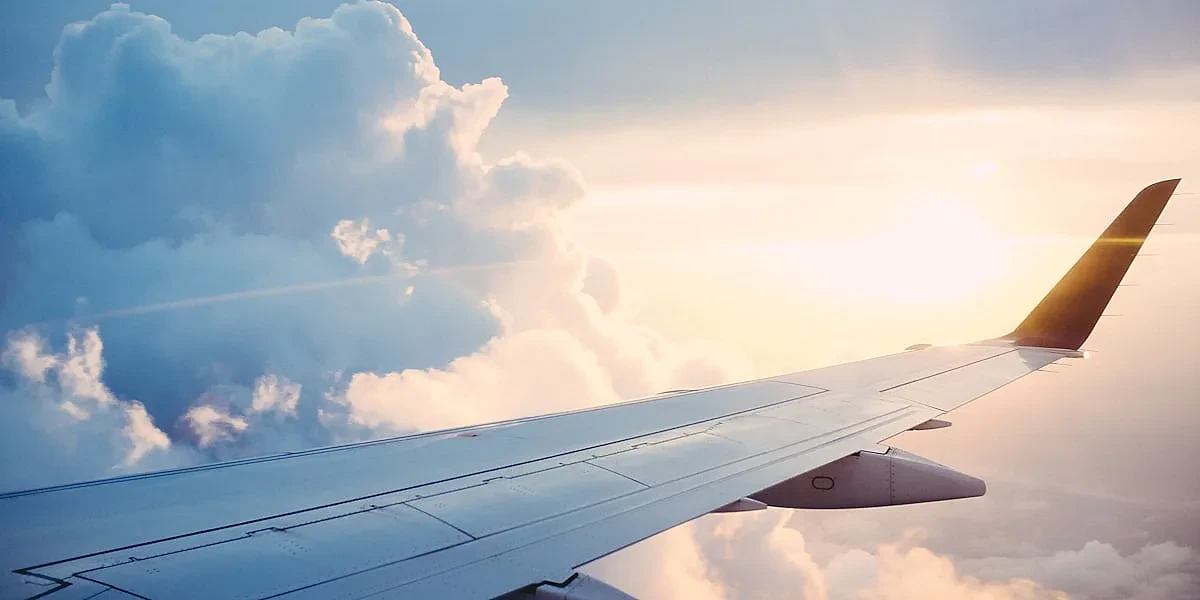 Airplane flying through clouds