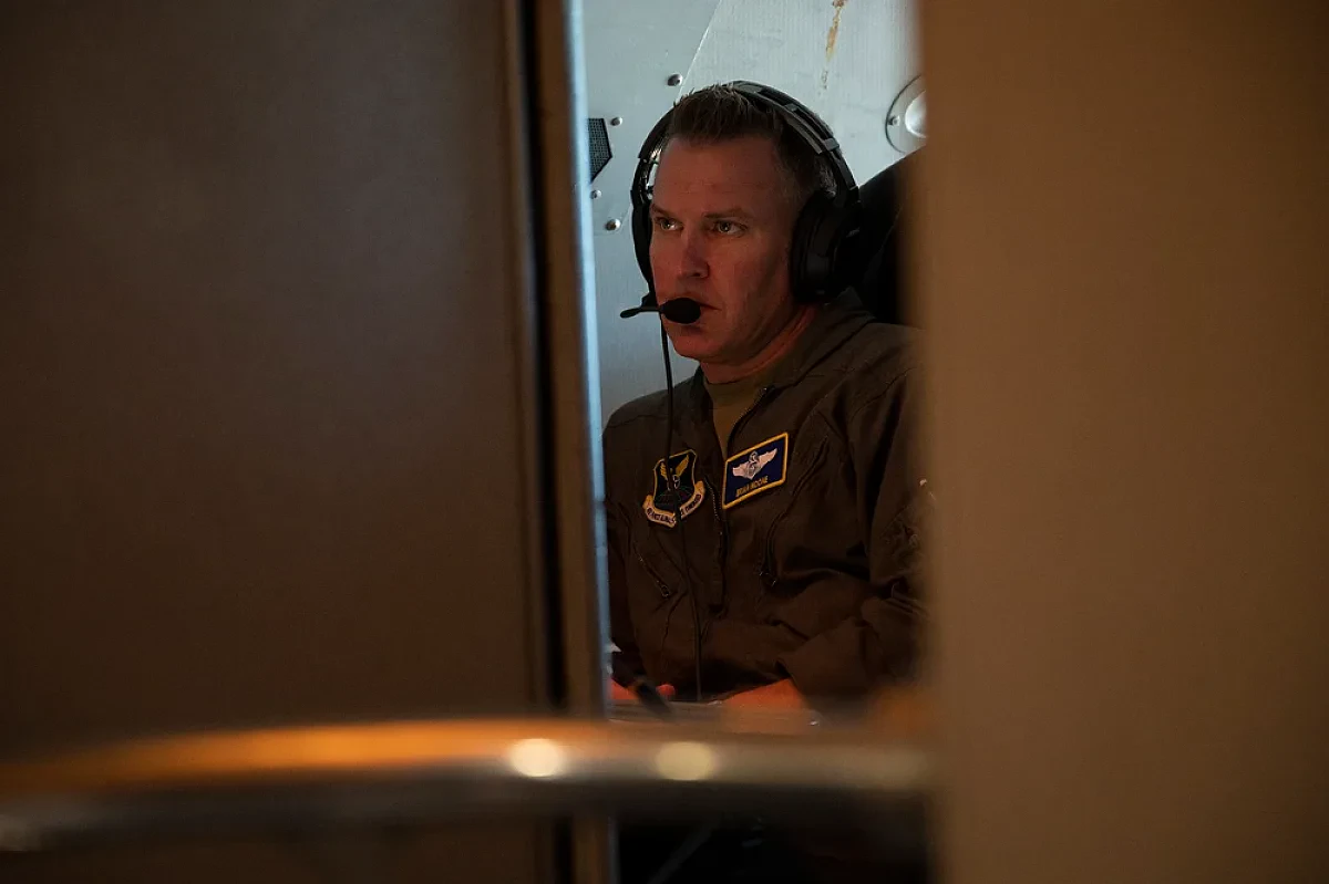 E-4B navigator assessing routes during flight